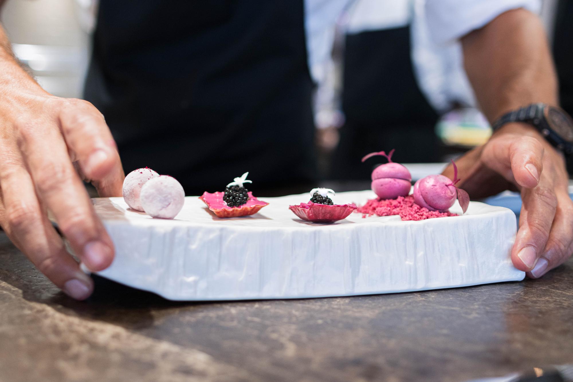 Workshop participants plating desserts